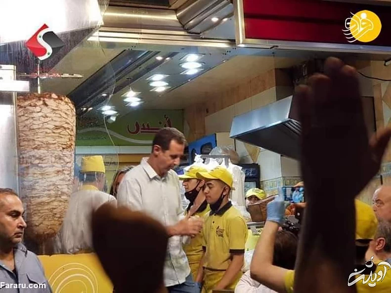 ساندویچ خوری بشار اسد و خانواده اش در خیابان‌ های دمشق/ عکس